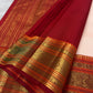 Close view of Arakku Red and antique-gold multi-register Varisaipet border on ivory Kanjeevaram silk.
