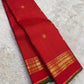 Arakku Red Handwoven Pure Silk Kanchipuram Saree with Zari Kattam Floral Butta and Kaal Irangiya Border