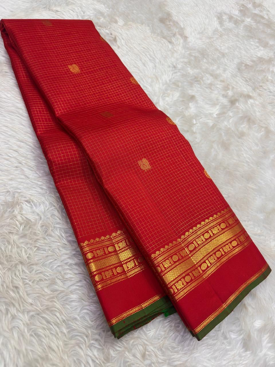 Arakku Red Handwoven Pure Silk Kanchipuram Saree with Zari Kattam Floral Butta and Kaal Irangiya Border