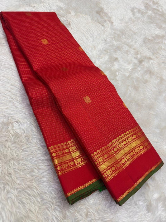 Arakku Red Handwoven Pure Silk Kanchipuram Saree with Zari Kattam Floral Butta and Kaal Irangiya Border