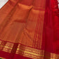 Arakku Red Handwoven Pure Silk Kanchipuram Saree with Zari Kattam Floral Butta and Kaal Irangiya Border