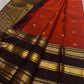 Terracotta Orange-Red pure silk Kanchipuram body with spaced gold zari buttas