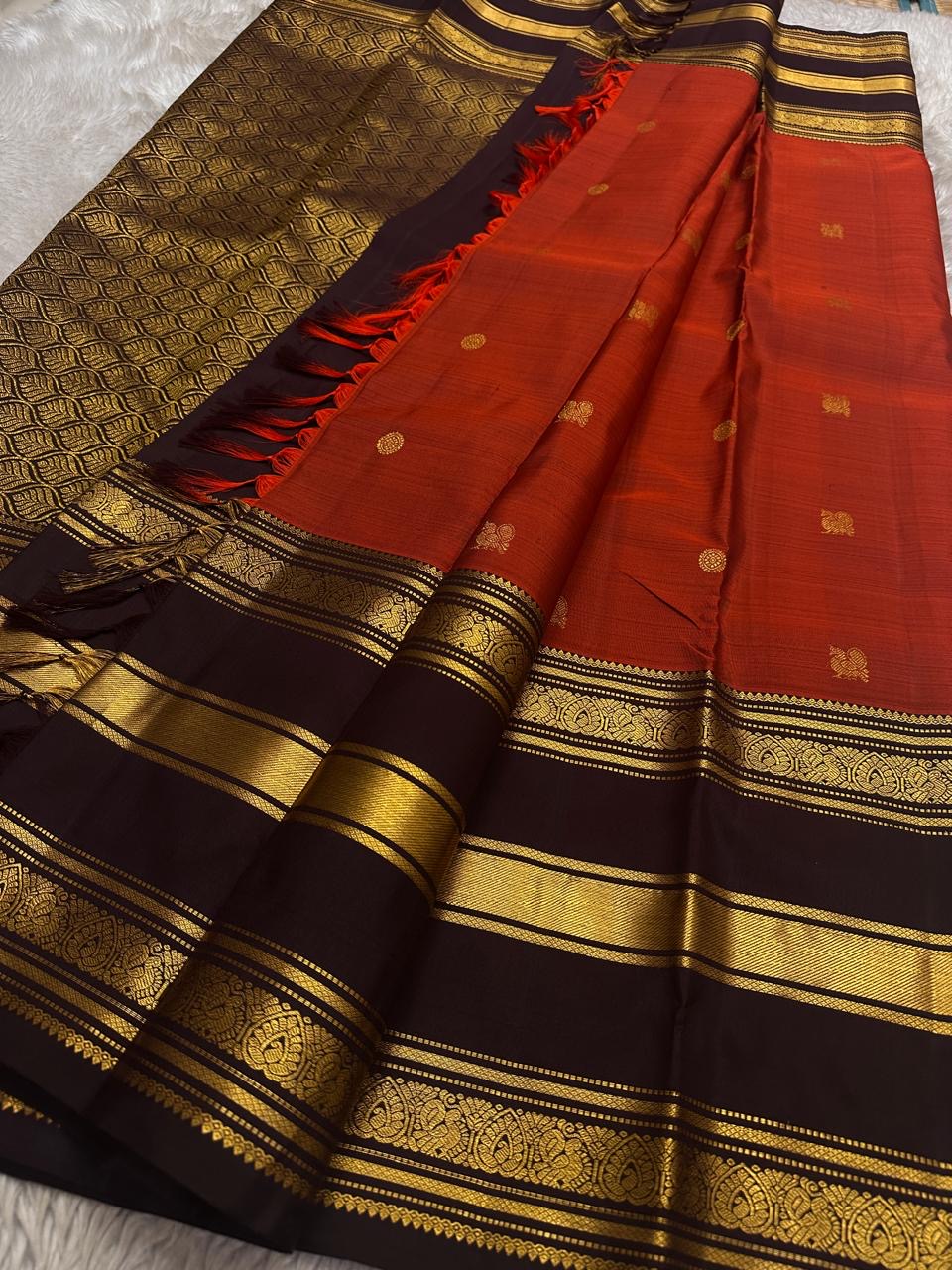 Terracotta Orange-Red pure silk Kanchipuram body with spaced gold zari buttas