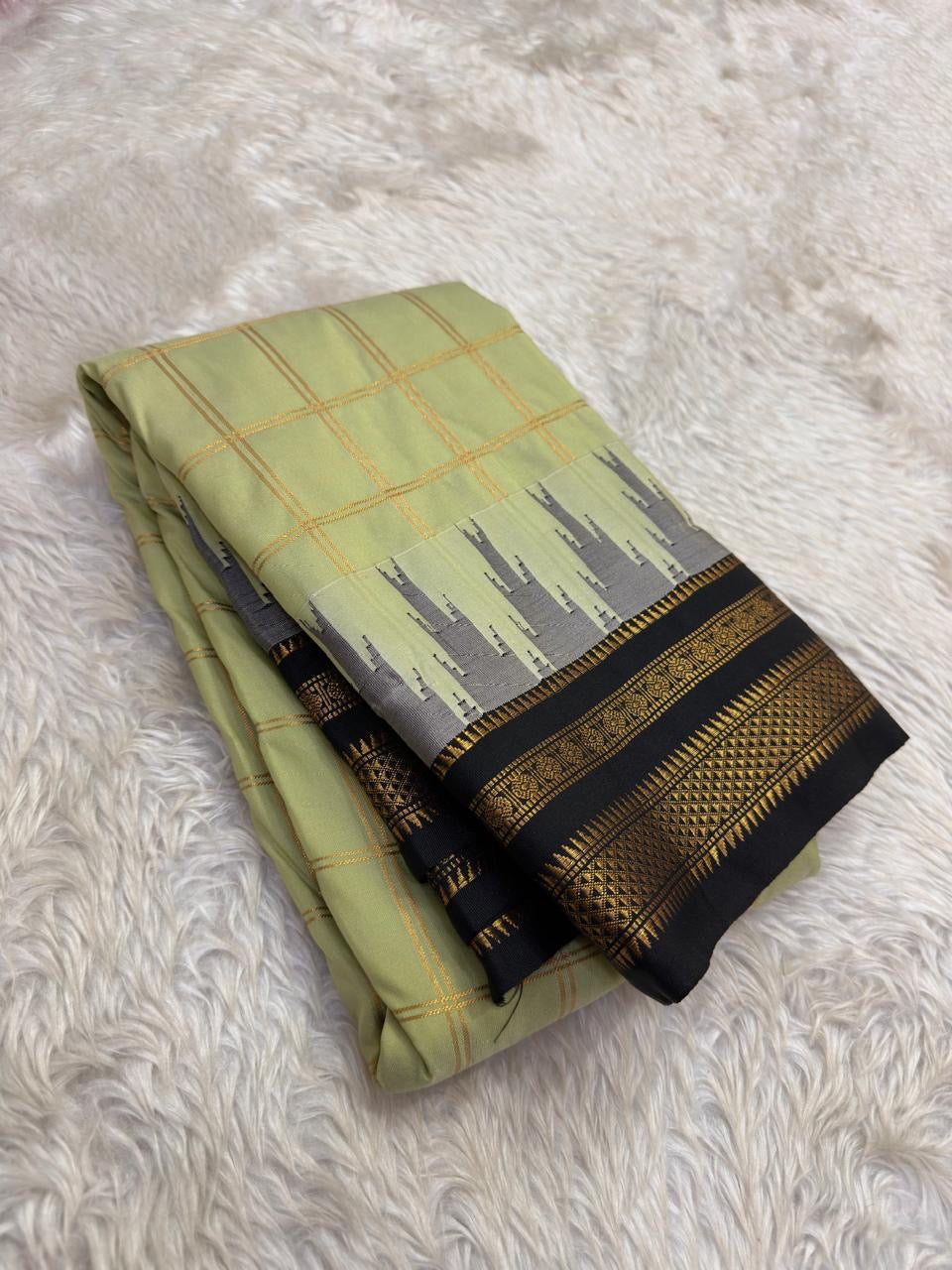 Silk Mark certified Arani pattu saree with elegant Thazampoo Reku border