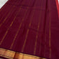 Brick Red and Deep Arakku Maroon lightweight Kanchipuram silk saree, broad gold zari border and striped maroon pallu; zari pattern