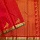 Warm gold zigzag seer pallu with Kili bird motifs on a vermilion red pure silk Kancheepuram saree