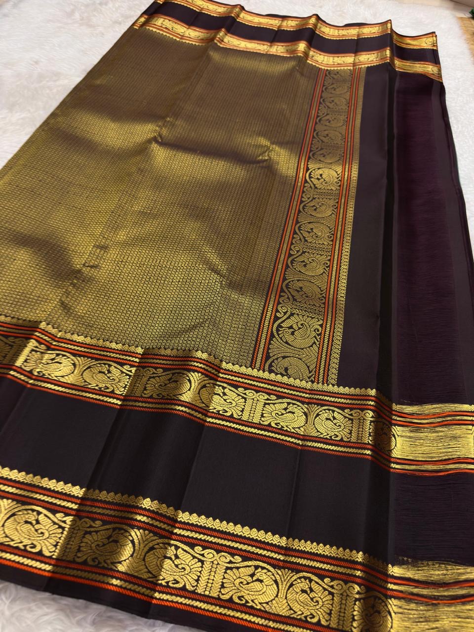Ash blue Kanjeevaram silk saree with cocoa brown korvai border and traditional gold zari border detail Idam Living