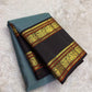 Ash blue Kanjivaram silk saree with cocoa brown korvai rettapet border folded display Idam Living