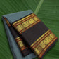 Ash blue Kanchipuram silk saree with cocoa brown korvai rettapet border and gold zari motifs on banana leaf Idam Living