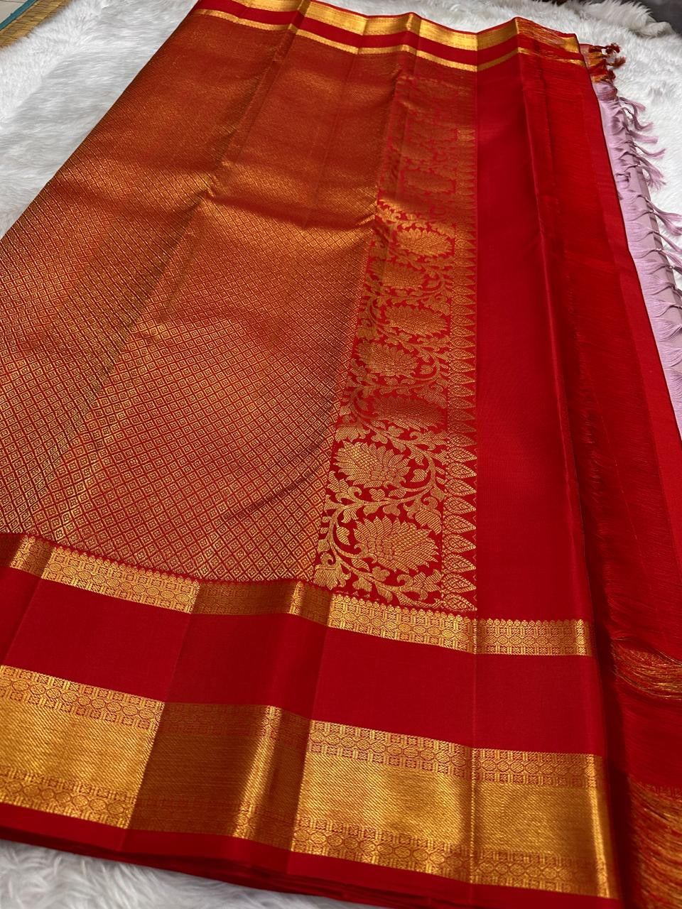 Ash Lilac Kanjivaram silk saree with geometric floral gold zari buttas