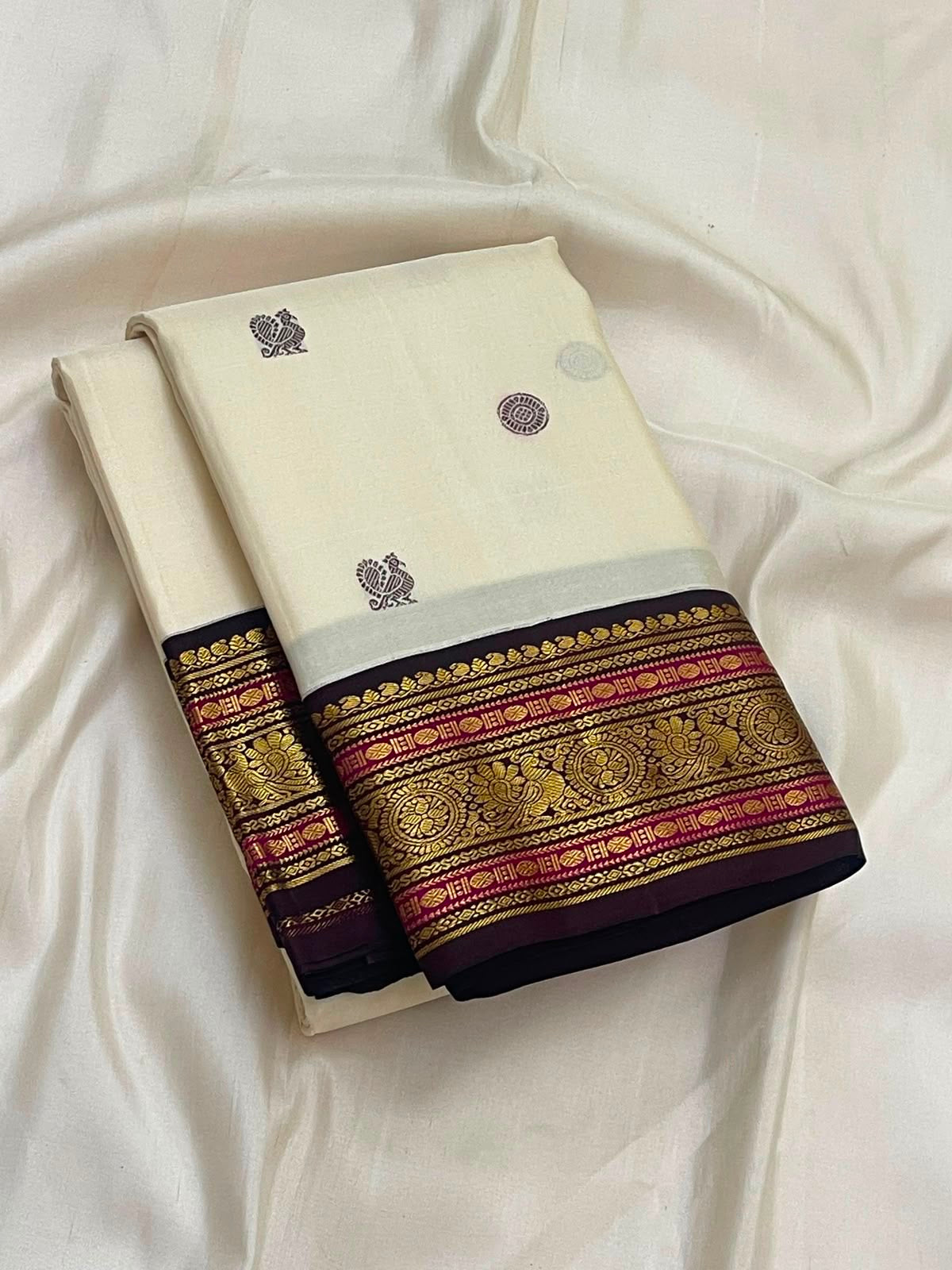Warm Ivory Pure Silk Kanchipuram Saree | Butta | Aubergine Zari Border