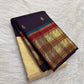 Handwoven Annapakshi zari buttas on aubergine Kanchipuram tissue silk