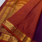 Rust-red Kanjipuram border with broad figurative bird-and-floral style classic-gold zari ornament.