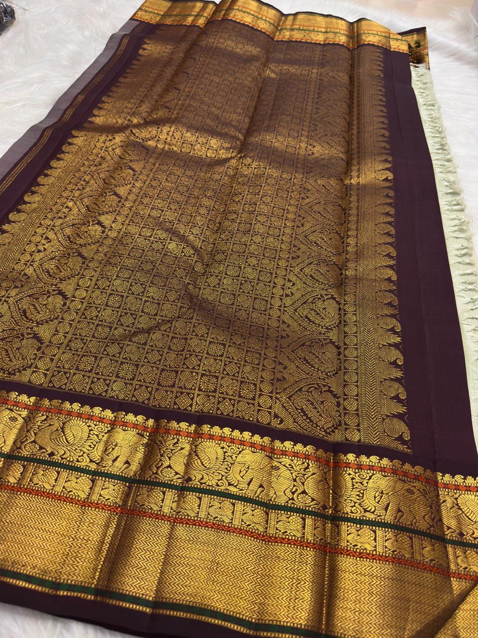Ivory Green Undertone Handwoven Pure Silk Kanjipuram Saree with Aubergine Korvai Mayil Zari Border