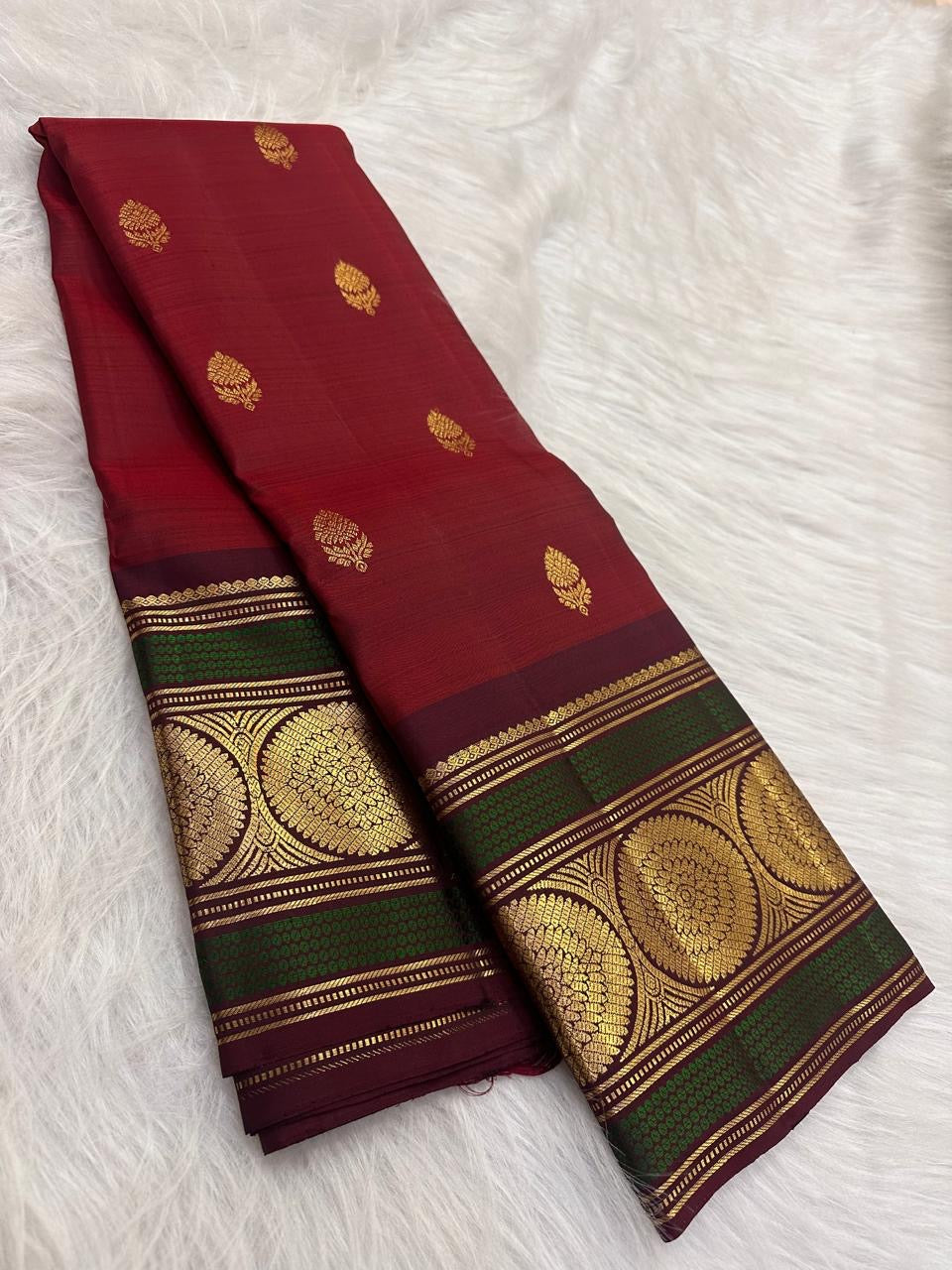 Deep Aubergine Kanchipuram border with Peacock Green bands and gold lotus medallions