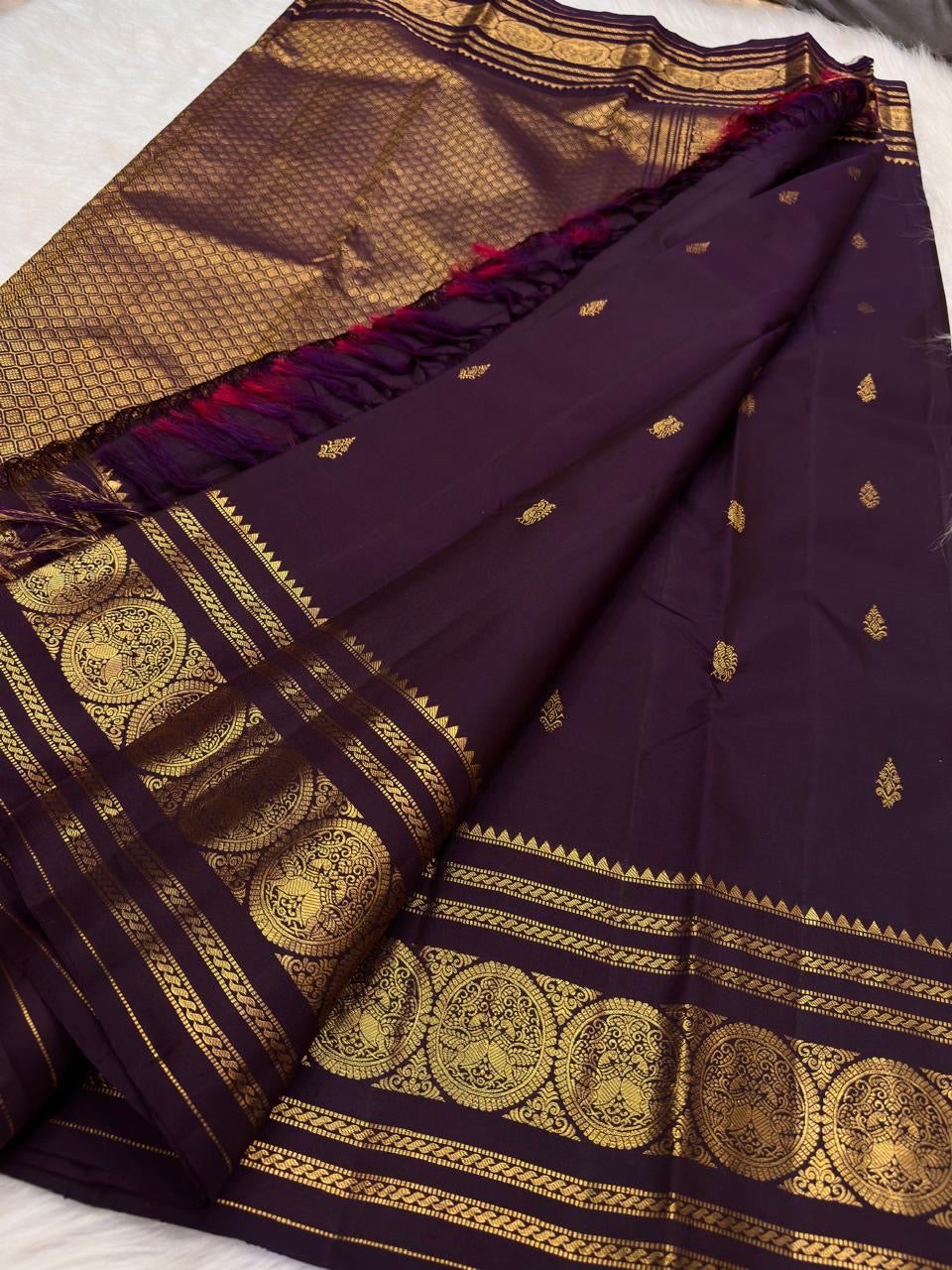Dusky Aubergine Handwoven Pure Silk Kancheepuram Saree with Mayil Zari Buttas and Antique Pon Zari Border