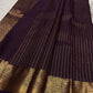 Aubergine Purple pure silk Kanchipuram saree with antique-gold woven detailing.