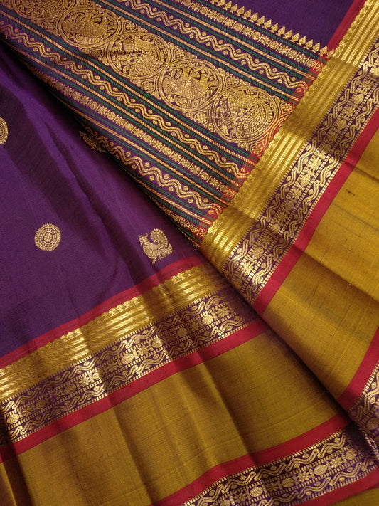 Close view of aubergine purple Kanchipuram silk saree body with alternating kamalam and mayil butta in gold zari — Idam Living