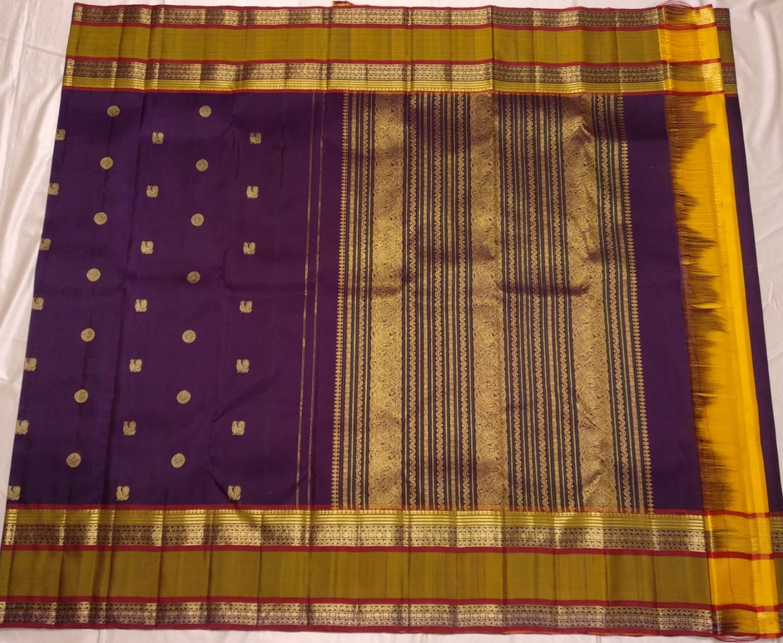 Ponvandu muted yellow korvai border with rettapet gold zari lines and veldhari silk thread work on aubergine purple saree — Idam Living
