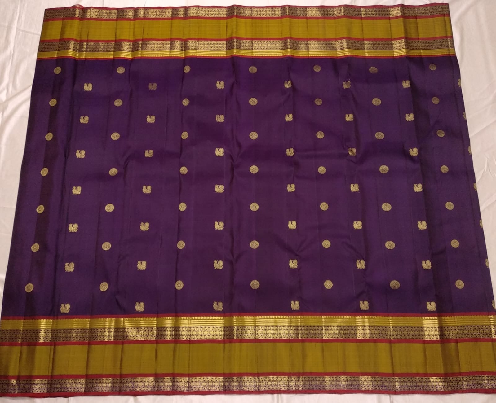 Sorgavasal mayil peacock motifs in dense gold zari pallu on aubergine purple Kanchipuram silk saree — Idam Living