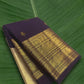 Pure Kanchipuram silk saree in aubergine purple with antique gold peacock zari border