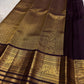 Deep Brown saree with purple Kanchana shimmer, antique-gold ornamental zari registers and Red selvedge.