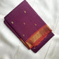 Handwoven Pure Silk Kanjipuram Butta saree with an open purple body and spaced paisley-shaped zari motifs.