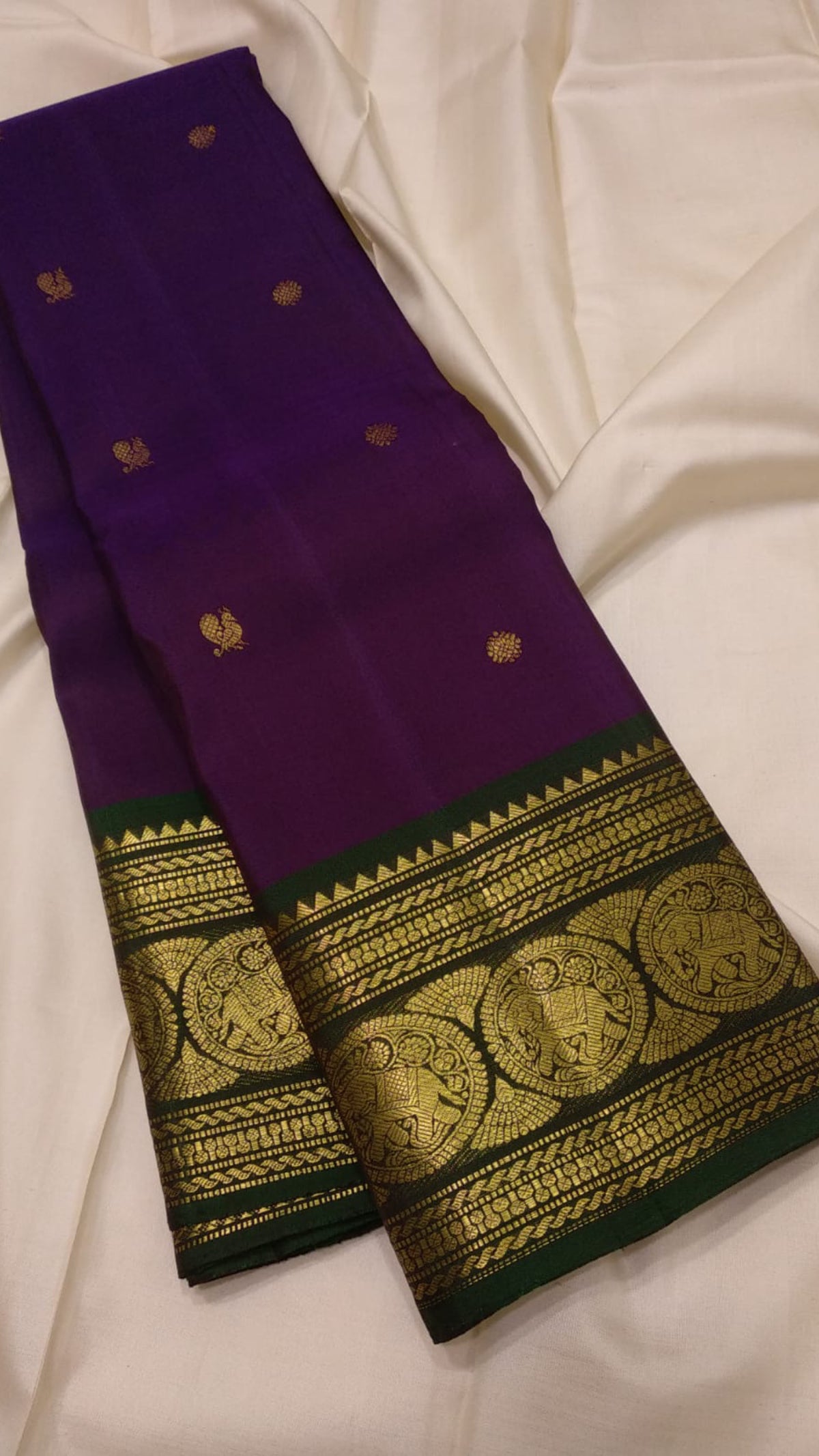 Handwoven purple Kanjivaram saree with antique gold zari buttas