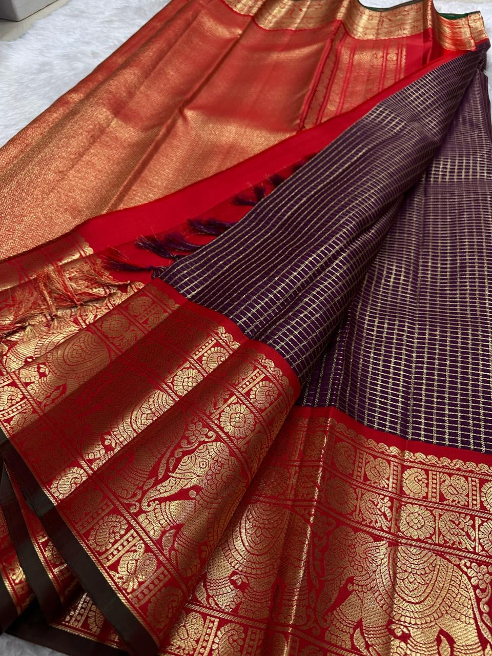 Deep Aubergine Zari Kattam saree with broad red and gold Yanai border