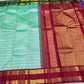 Pastel mint green handwoven pure silk Kanjivaram rettapet saree with Ganga-Jamuna borders, view 1