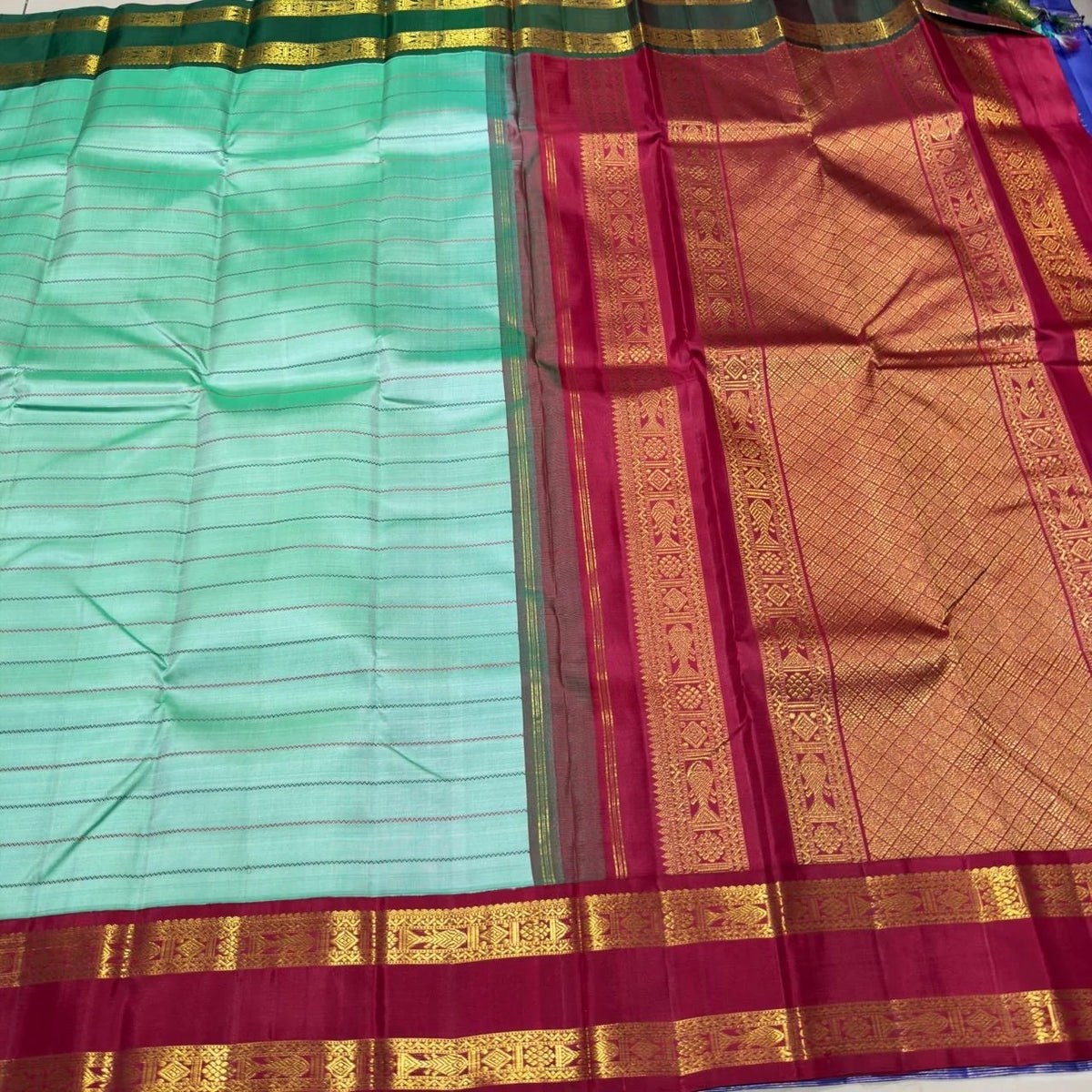 Pastel mint green handwoven pure silk Kanjivaram rettapet saree with Ganga-Jamuna borders, view 1