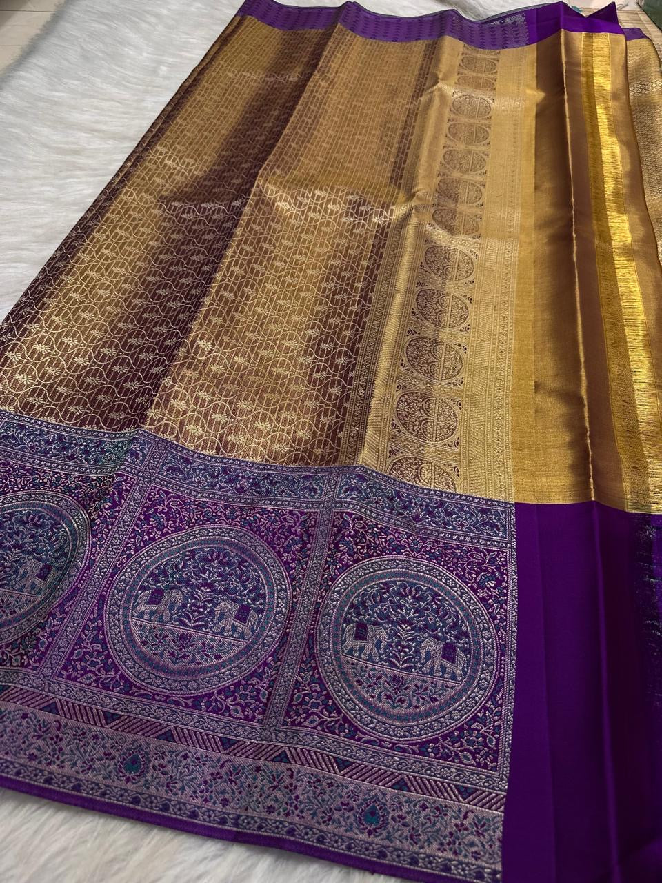 Antique gold handwoven pure silk Banarasi-Kanchipuram fusion saree with Kathiripoo purple, gold zari latticework and elephant medallions