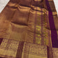 Handwoven Deep Plum Bronze Kanchipuram silk saree, zari texture, twin peacock border panels