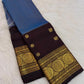 Azure Blue handwoven pure silk Kanjivaram Butta saree with Deep Kanchana Brown contrast.