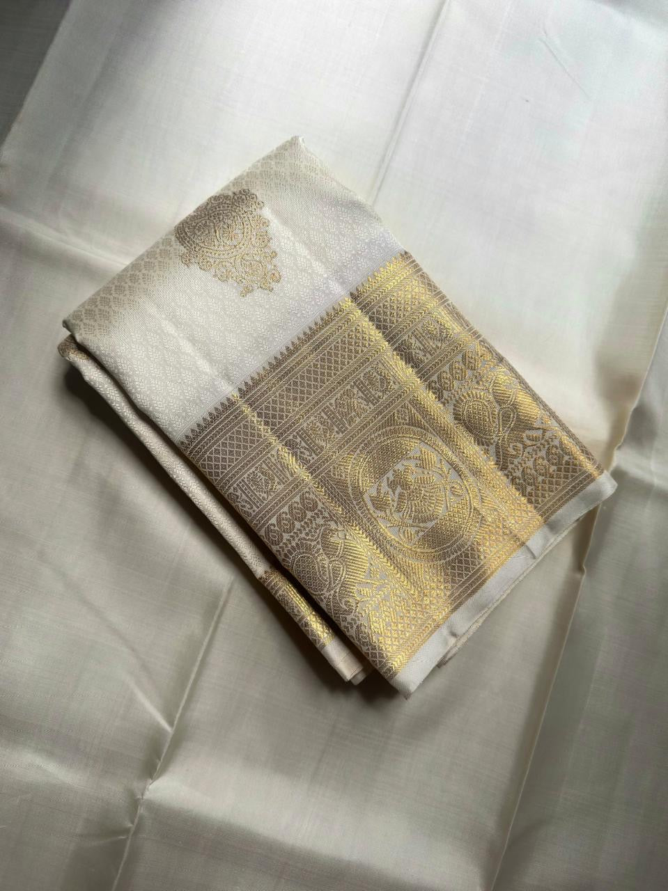 Ivory Handwoven Pure Silk Kanjivaram Saree with Gold Zari Buttas and Ornate Border – additional detail view 6