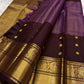 Rich coffee brown pure Kanchipuram silk saree with zari kattam weave – folded view