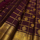 Burgundy brown pure silk Kanchipuram saree with gold zari kattam grid, folded view