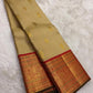 Warm Beige and Deep Vermillion Handwoven Pure Silk Kanchipattu Saree with Varisaipet Sorgavaasal Mayil Border