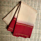 Pillar-box red Korvai border on sandalwood pure silk Kanchi Pattu saree