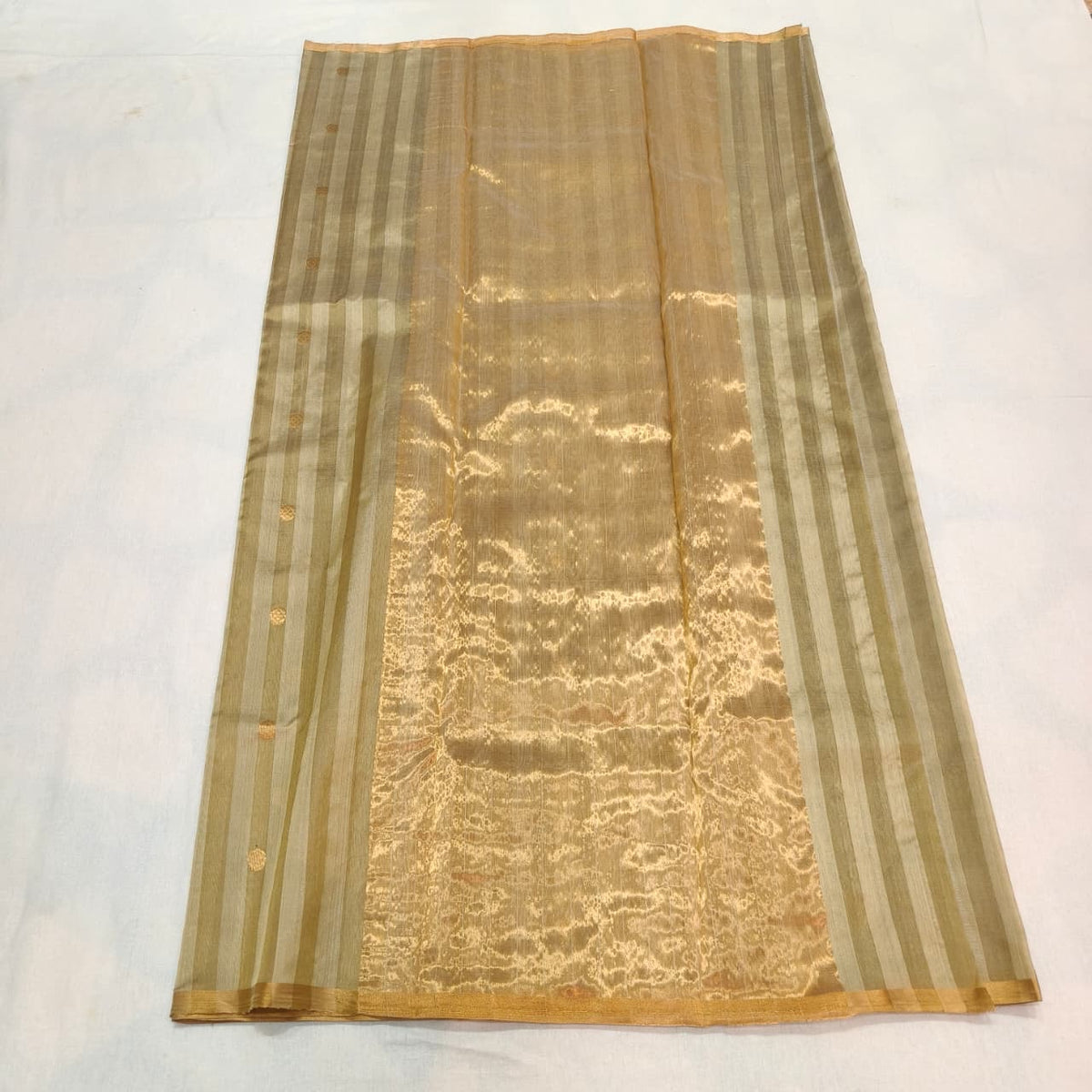 Sandalwood Beige striped Chanderi silk saree showing tonal vertical stripes, gold buttas and narrow gold edging