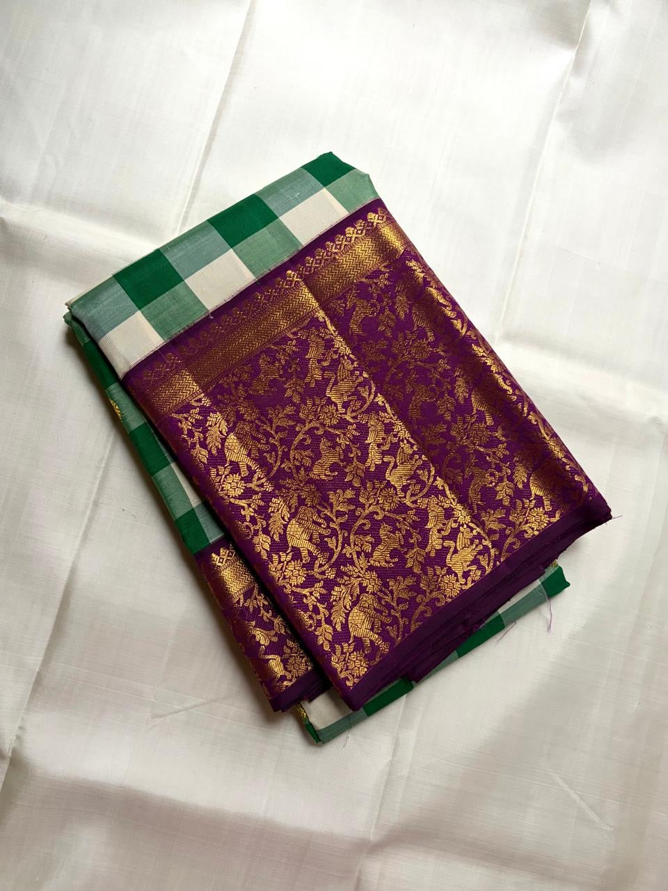 Betel Leaf Green Checked Handwoven Pure Silk Kancheepuram Saree with Deep Plum Korvai Vanasringaram Pallu