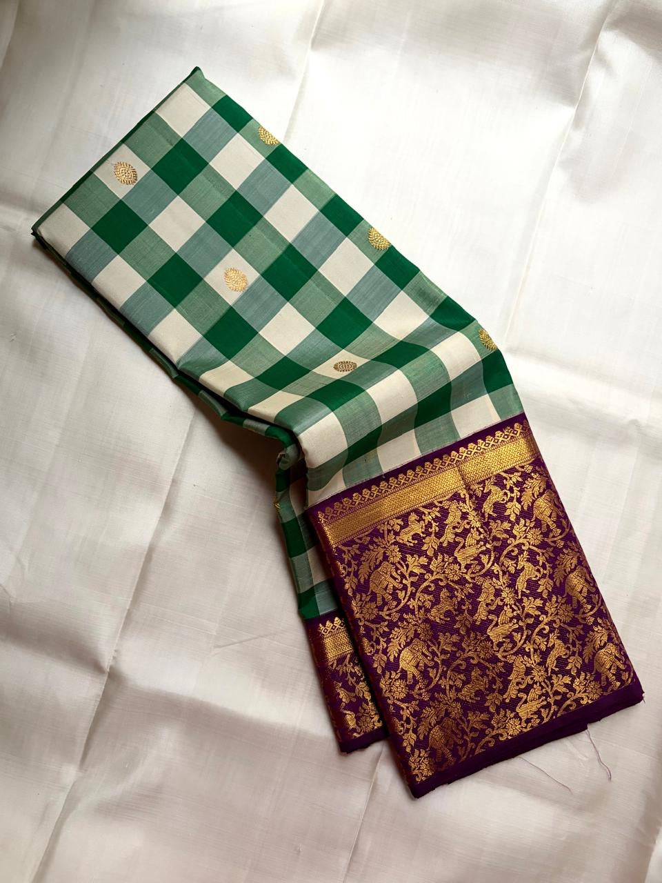 Betel Leaf Green Checked Handwoven Pure Silk Kancheepuram Saree with Deep Plum Korvai Vanasringaram Pallu
