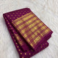 Handwoven pure silk Kanchipuram butta saree in deep brown with round gold zari buttas and a Varisaipet border.