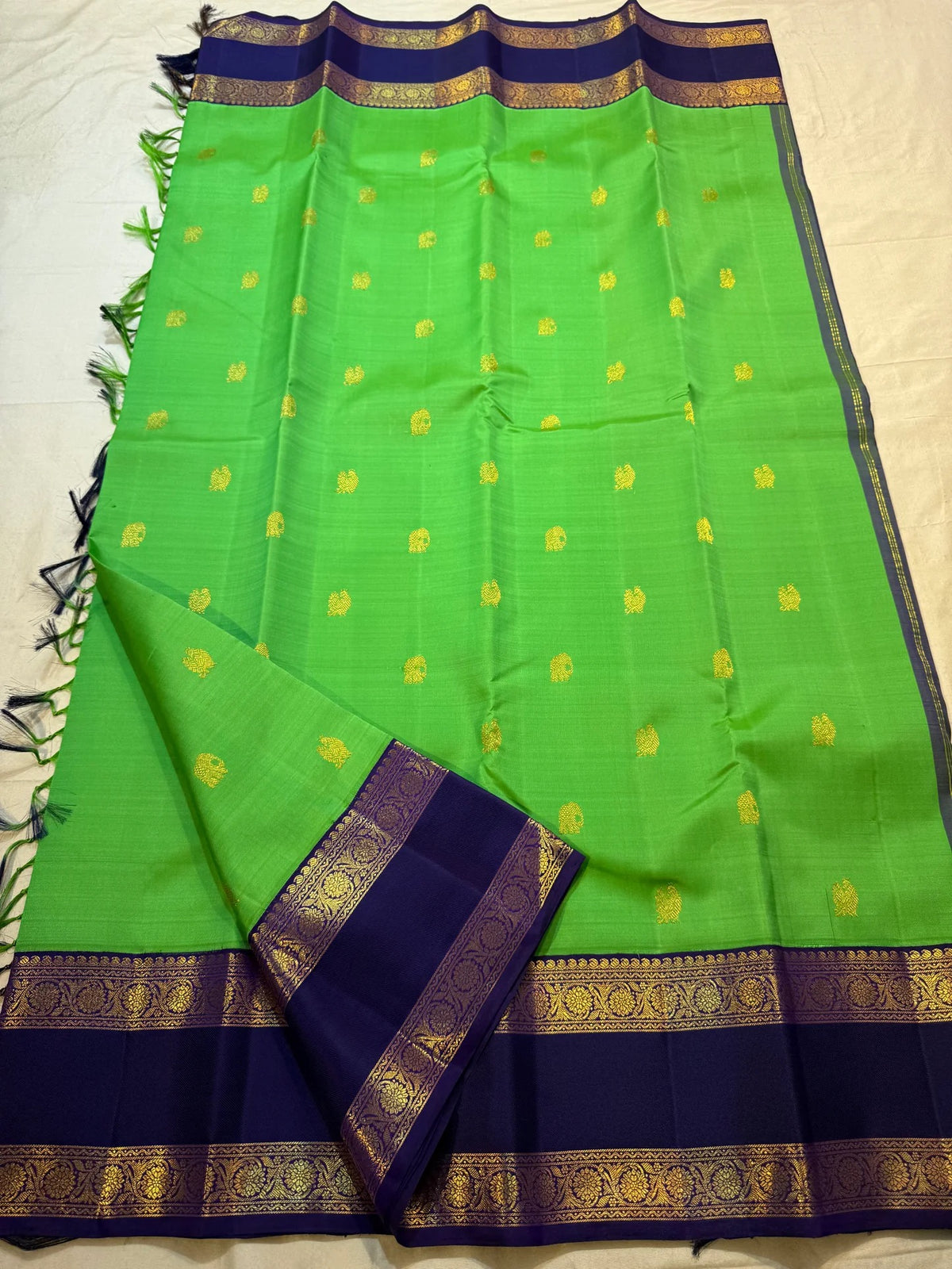 Bird-on-branch zari pallu on handwoven Kanjivaram silk saree