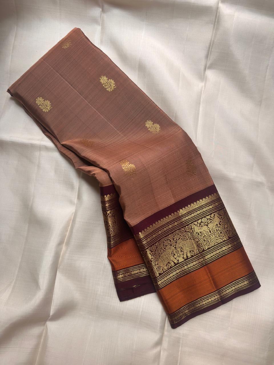 Biscuit Brown pure silk KanchiPattu saree, Butta weave with Deep Aubergine border — body weave close-up