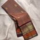 Biscuit Brown pure silk KanchiPattu saree, Butta weave with Deep Aubergine border — folded view