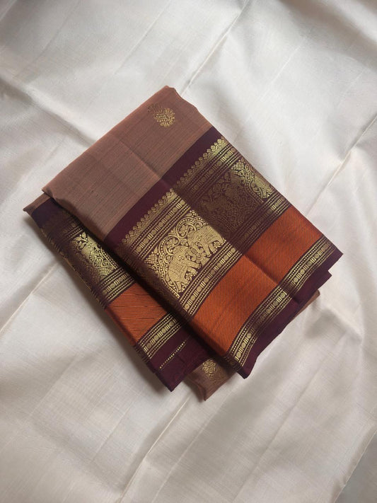 Biscuit Brown pure silk KanchiPattu saree, Butta weave with Deep Aubergine border — full drape view
