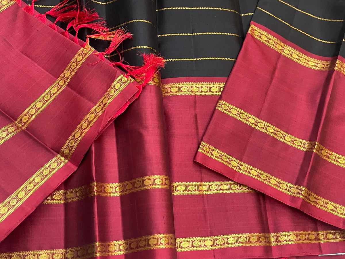 Vintage-inspired black and red Pure Silk Kanjipuram saree with temple-colour palette