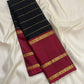 Korvai contrast between black body and Arakku red border on vintage Kanjipuram saree