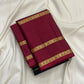 Deep black Kanjipuram silk with fine lengthwise gold Veldhari lines and Arakku red border